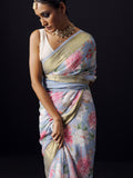 Greyish blue floral saree with golden zari border