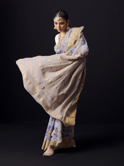 Grey floral saree with golden zari border