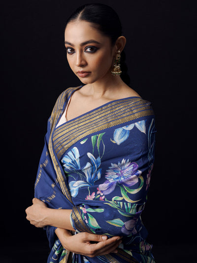 Navy floral saree with golden zari border