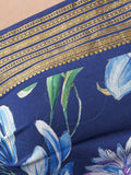 Navy floral saree with golden zari border