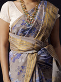 Grey floral saree with golden zari border